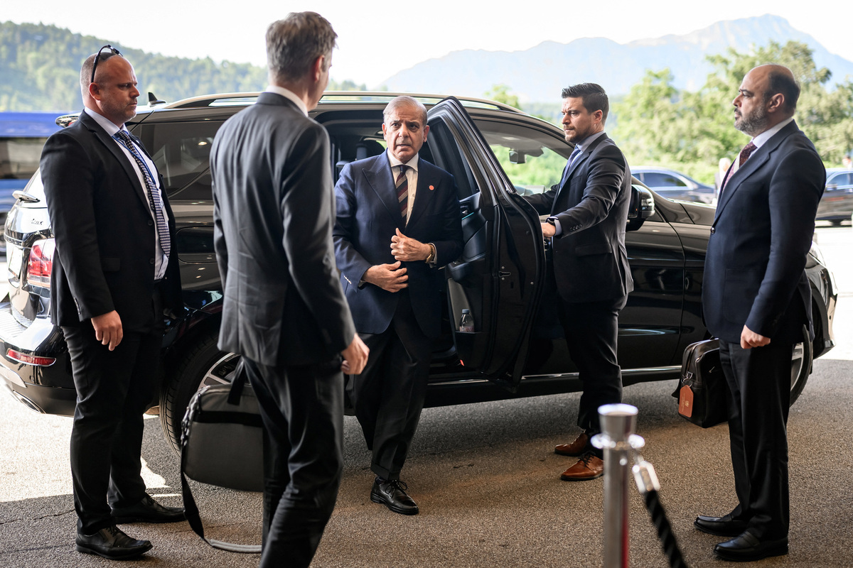 Pakistan's Prime Minister Muhammad Shehbaz Sharif (C) arrives at the Buergenstock luxury hotel complex overlooking Lake Lucerne, Switzerland, on June 21, 2026, ahead of high-level talks aimed at advancing a deal to end the Middle East conflict.  Fabrice Coffrini/Pool via REUTERS