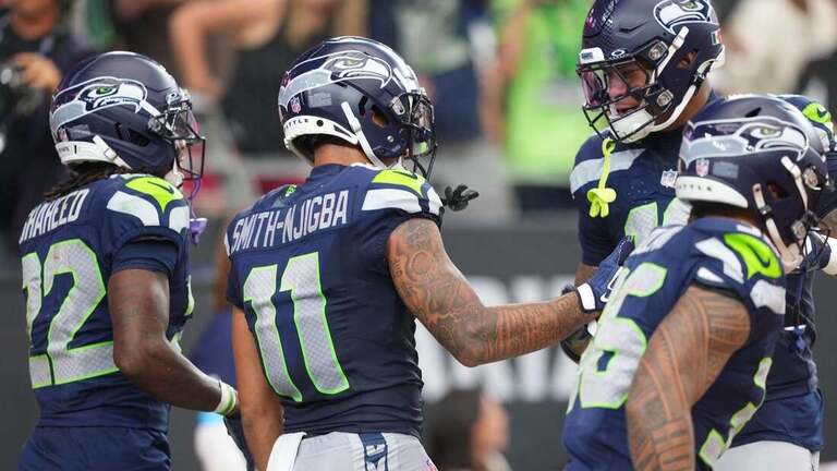Jaxon Smith-Njigba's 3 TDs help Seahawks pull away from Cardinals 