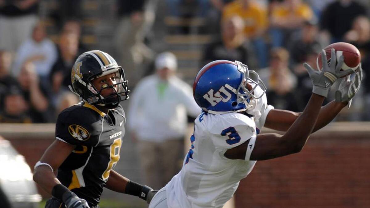  Kansas cornerback Aqib Talib tries to intercept a pass intended in a 2006 game against Missouri. | Denny Medley-Imagn Images 