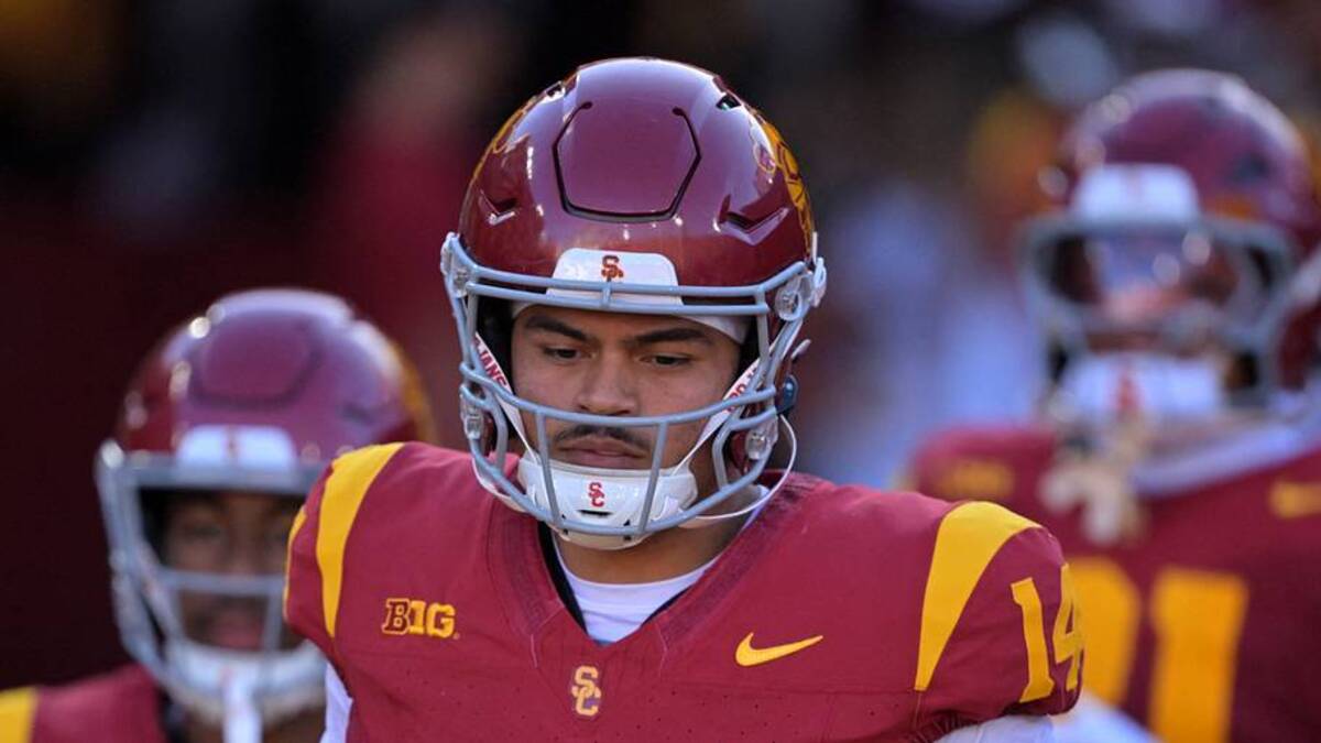  Oct 11, 2025; Los Angeles, California, USA; USC Trojans quarterback Jayden Maiava (14) heads on to the field for the game against the Michigan Wolverines at United Airlines Field at the Los Angeles Memorial Coliseum. Mandatory Credit: Jayne Kamin-Oncea-Imagn Images | IMAGN IMAGES via Reuters Connect 