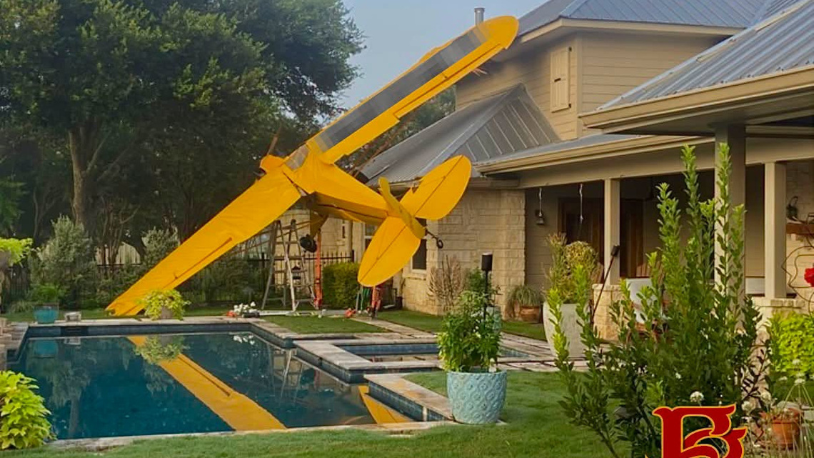Pilot injured after a small plane lands on roof of a Houston-area home 