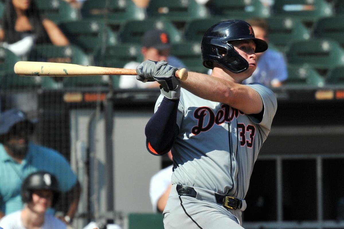 Detroit Tigers second baseman Colt Keith (33) hits a two-run double during the eighth inning against the Chicago White Sox at Guaranteed Rate Field.