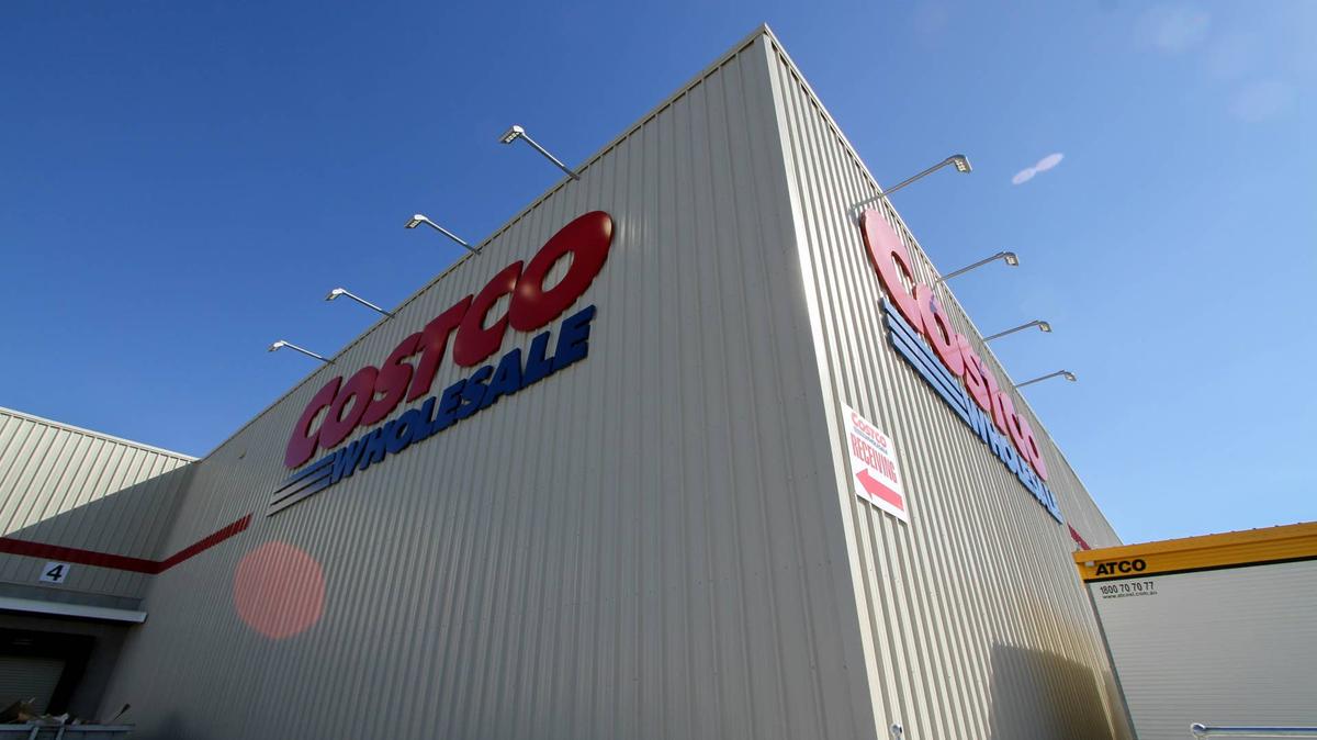 Costco storefront on sunny day.