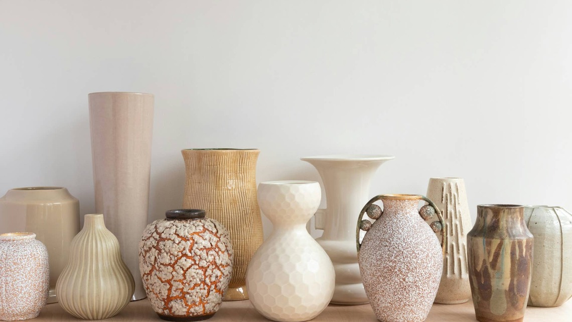 Woman's $5 Dollar Tree DIY Turns Picture Frames Into a Stunning Vase 