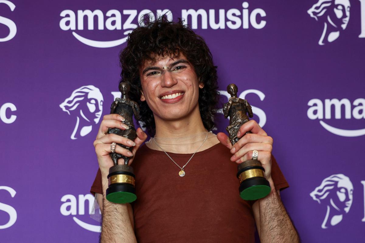 Jacob Alon winner of the Rising Star Award and the Best Song Musically and Lyrically award, poses in the winners room at the Ivor Novello Awards in London, Britain, May 21, 2026. REUTERS/Jack Taylor