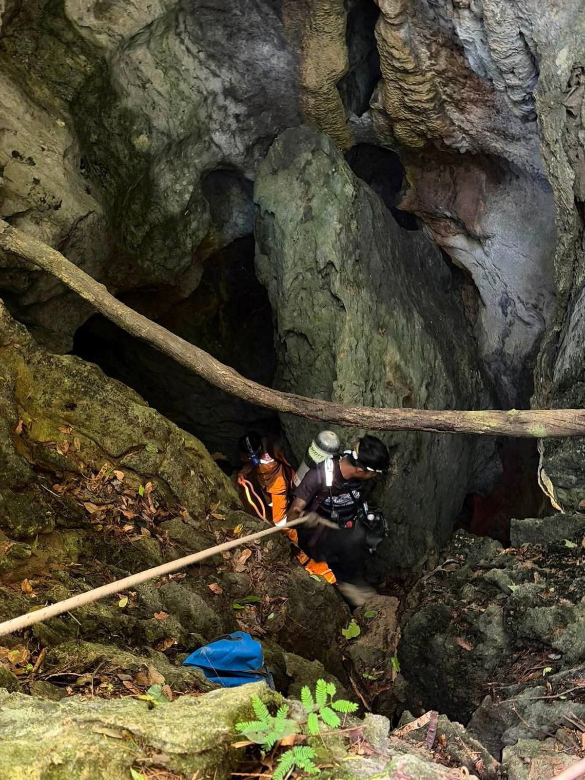 Members of a rescue team work to save seven people trapped in a cave, at a location given as Xaisomboun Province, Laos, in this handout image released May 26, 2026. Metta Tham Kalasin Rescue/Handout via REUTERS