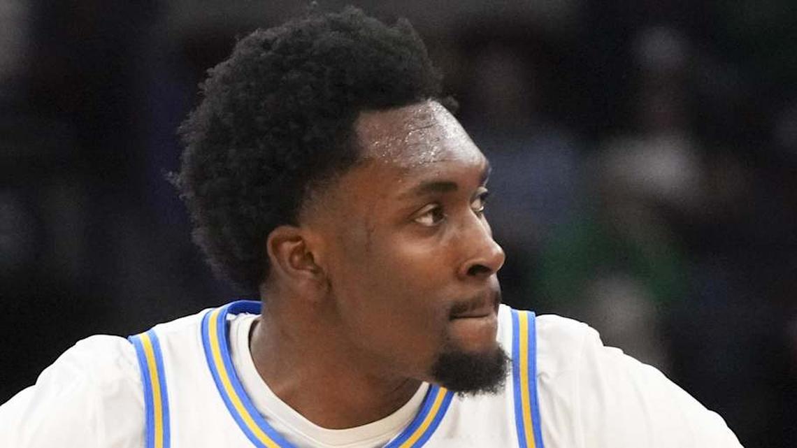  Mar 14, 2026; Chicago, IL, USA; UCLA Bruins center Xavier Booker (1) reacts after making a three point basket against the Purdue Boilermakers during the first half at United Center. Mandatory Credit: David Banks-Imagn Images | David Banks-Imagn Images 