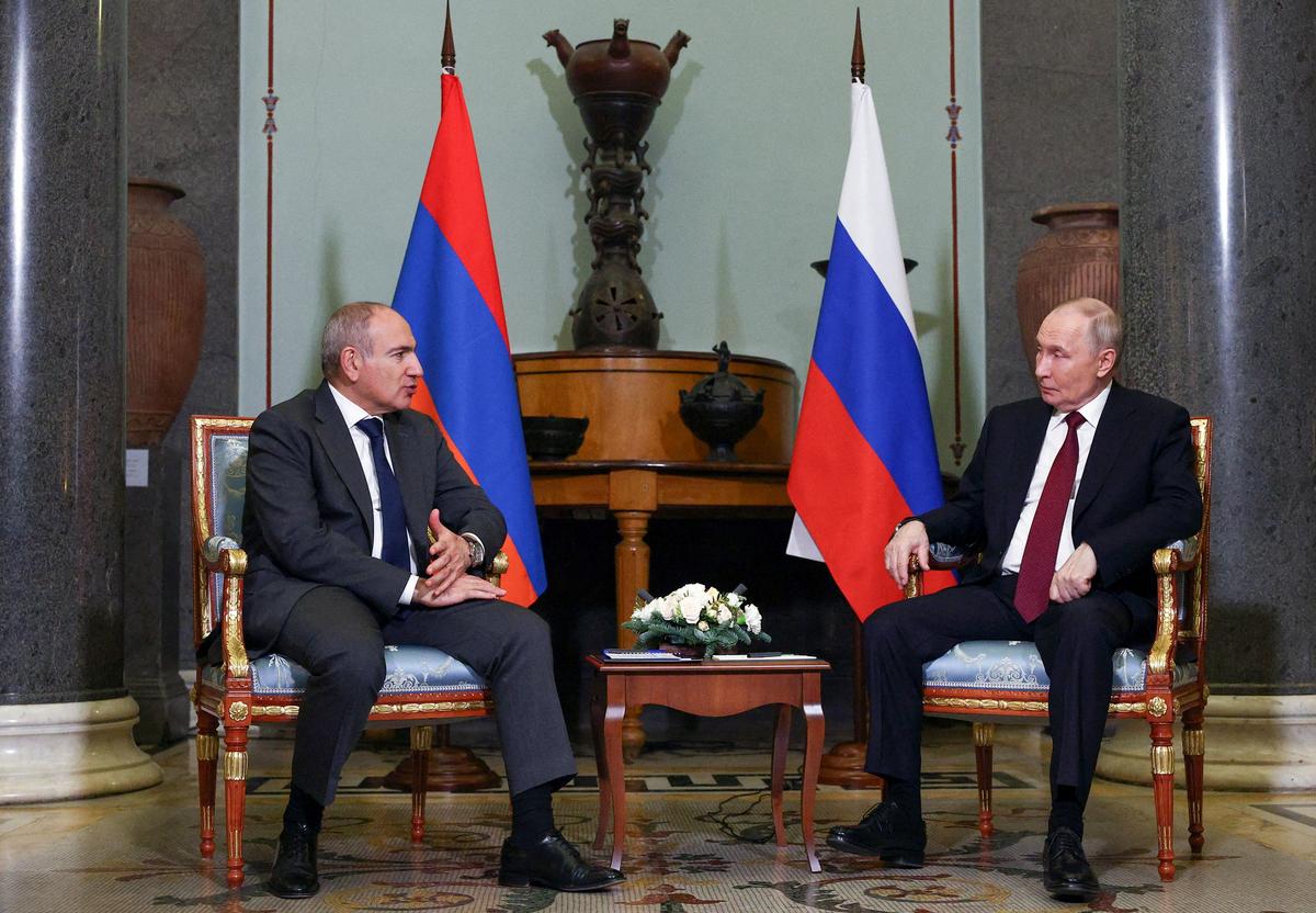 FILE PHOTO: Russian President Vladimir Putin attends a meeting with Armenian Prime Minister Nikol Pashinyan on the sidelines of an informal summit of leaders of nations, which are members of the Commonwealth of Independent States (CIS), in Saint Petersburg, Russia, December 22, 2025. Sputnik/Sergei Bulkin/Pool via REUTERS/File Photo