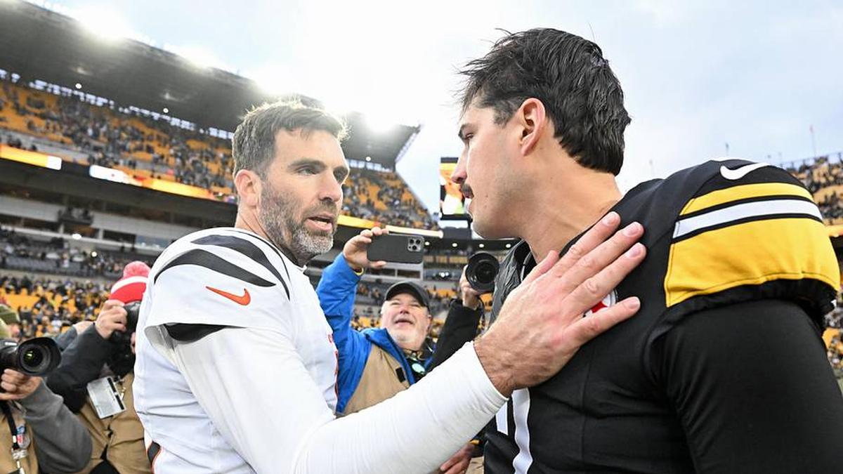  Nov 16, 2025; Pittsburgh, Pennsylvania, USA; Cincinnati Bengals quarterback Joe Flacco (16) greets Pittsburgh Steelers quarterback Mason Rudolph (2) after the game at Acrisure Stadium. Mandatory Credit: Barry Reeger-Imagn Images | Barry Reeger-Imagn Images 