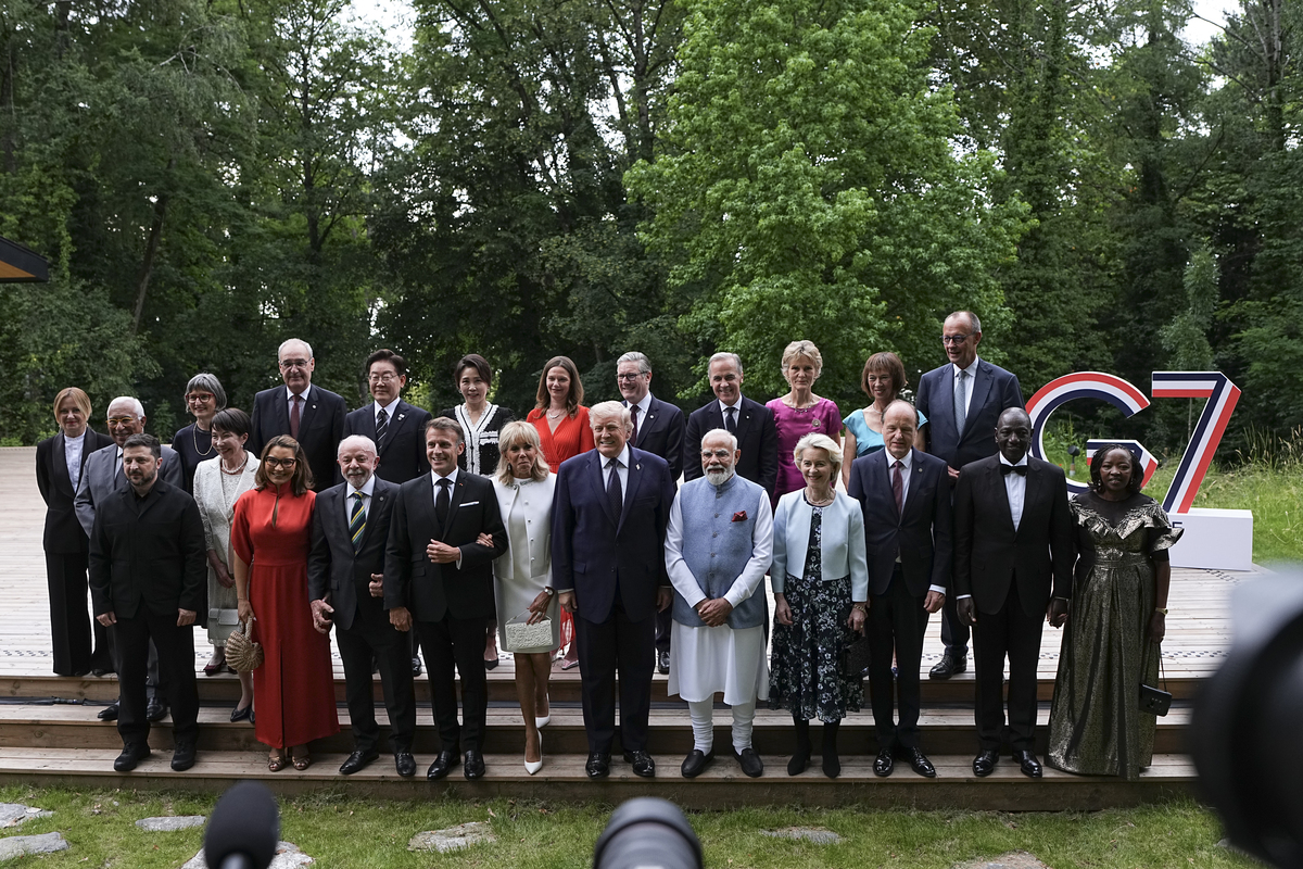 President Donald Trump, center, joins other world leaders for a group photo they attend a cultural performance amid the G7 Summit in Evian-les-Bains, France, June 16, 2026. (Haiyun Jiang/The New York Times)