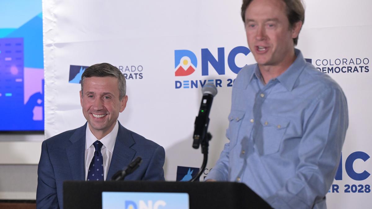 Denver Mayor Mike Johnston, right, introduces Democratic National Committee Chair Ken Martin during a news conference about the DNC's site visit for Denver's bid to host the 2028 Democratic National Convention at Ball Arena in Denver on Wednesday, May 6, 2026. (Hyoung Chang/The Denver Post/TNS)