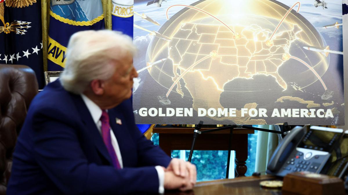 U.S. President Donald Trump looks on as he makes an announcement regarding the Golden Dome missile defense shield with U.S. Defense Secretary Pete Hegseth (not pictured) in the Oval Office of the White House in Washington, D.C., U.S., May 20, 2025. REUTERS/Kevin Lamarque