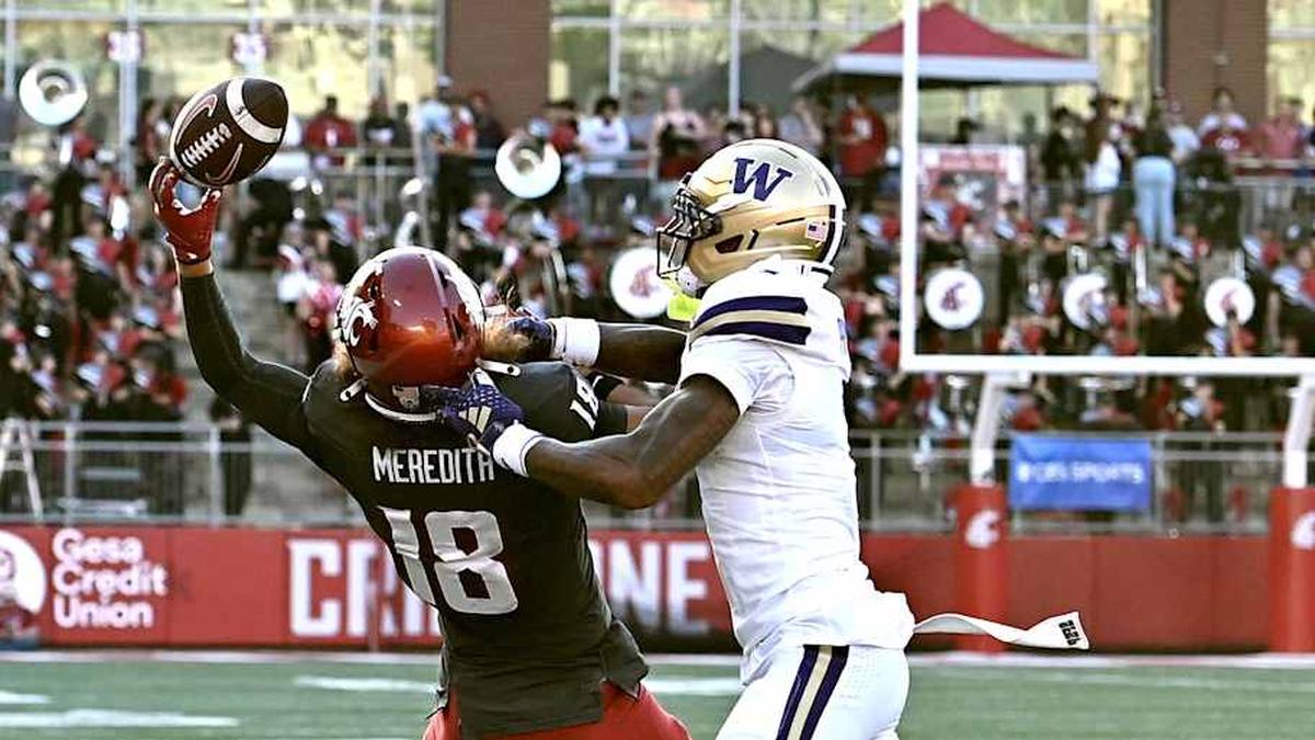 Sep 20, 2025; Pullman, Washington, USA; Washington Huskies linebacker Deven Bryant (17) forces an incomplete pass against Washington State Cougars wide receiver Joshua Meredith (18) in the first half of Apple Cup at Gesa Field at Martin Stadium. Mandatory Credit: James Snook-Imagn Images | James Snook-Imagn Images 