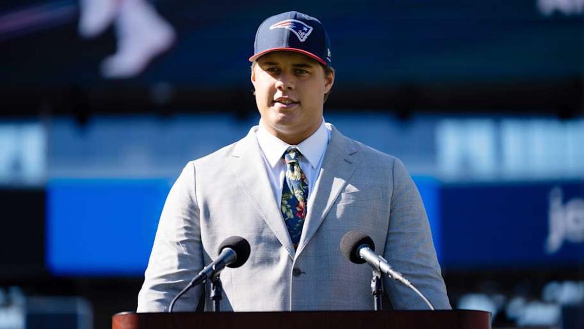  May 7, 2026; Foxborough, MA, USA; New England Patriots first round draft pick Caleb Lomu addresses the media during a press conference on the game field at Gillette Stadium. Mandatory Credit: Natalie Reid-Imagn Images | Natalie Reid-Imagn Images 