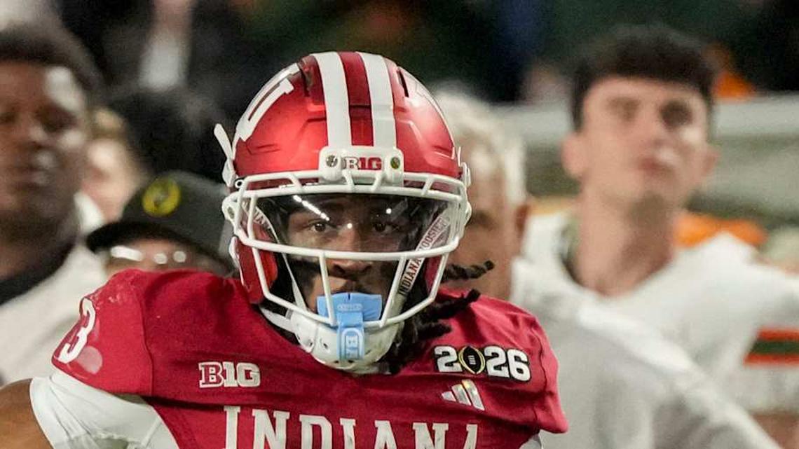  Indiana Hoosiers wide receiver Omar Cooper Jr. (3) runs down the sideline past Miami (FL) Hurricanes defenders Monday, Jan. 19, 2026, during the College Football Playoff National Championship college football game at Hard Rock Stadium in Miami Gardens. | Grace Hollars/IndyStar / USA TODAY NETWORK via Imagn Images 