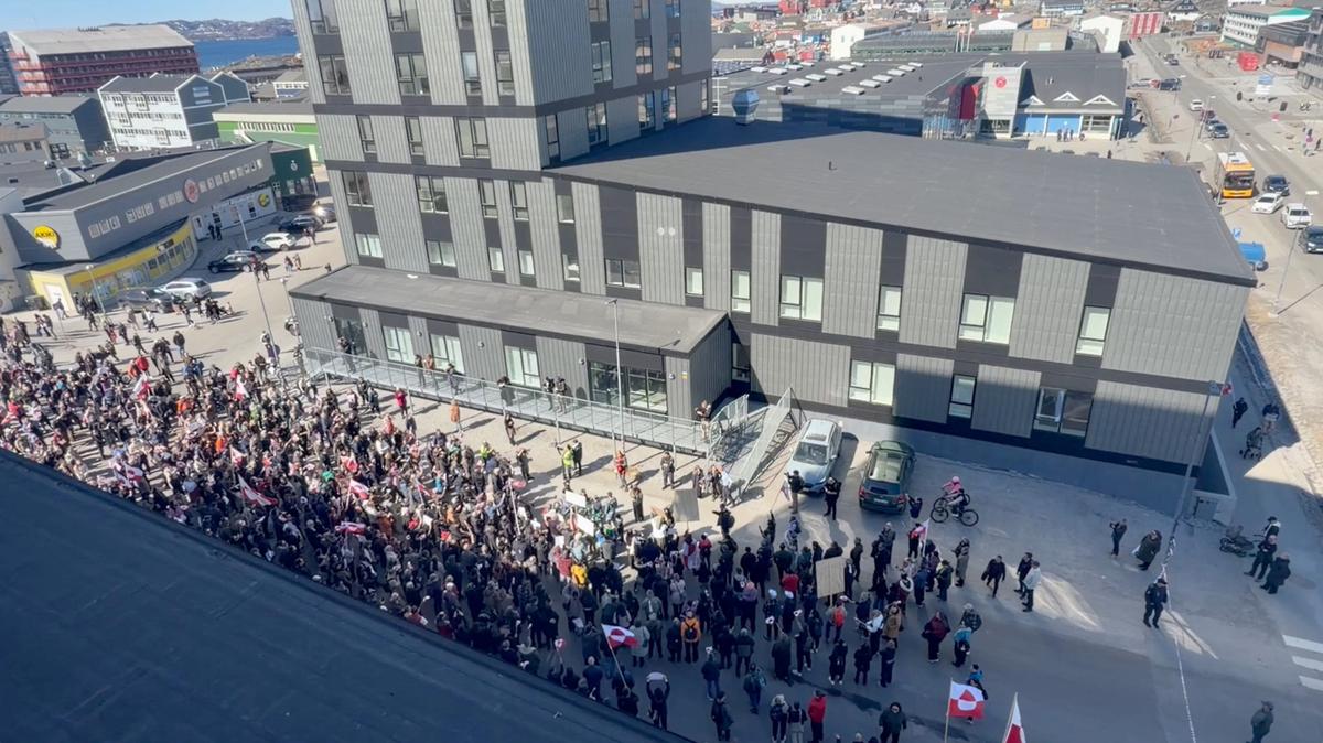 Protesters gather outside the new U.S. Consulate in Nuuk, Greenland May 21, 2026, in this frame capture obtained from a social media video. Orla Joelsen/via REUTERS