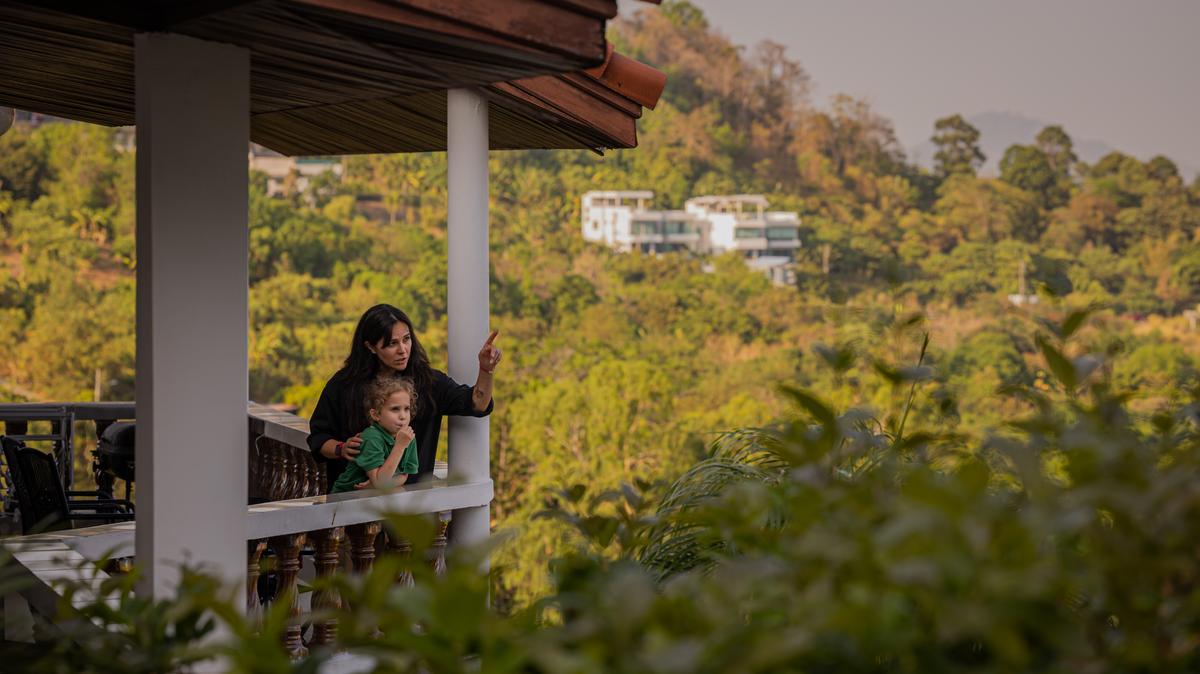 Ekaterina Mittsel, who moved to Phuket after Russia invaded Ukraine, and her daughter Alisa, 6, at their home in Rawai, Thailand on March 9, 2026. Thousands who fled Russia after the invasion of Ukraine have built an enclave in Phuket, though an air of impermanence hangs over their community. "We joke that we meet our friends here more often than we did in Moscow," Mittsel said. (Lauren DeCicca/The New York Times)..