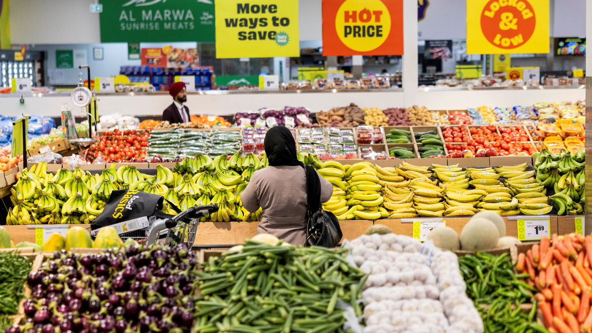 Customers browse the produce section in Chalo FreshCo grocery store in Brampton, Ontario, Canada, June 5, 2026. REUTERS/Carlos Osorio