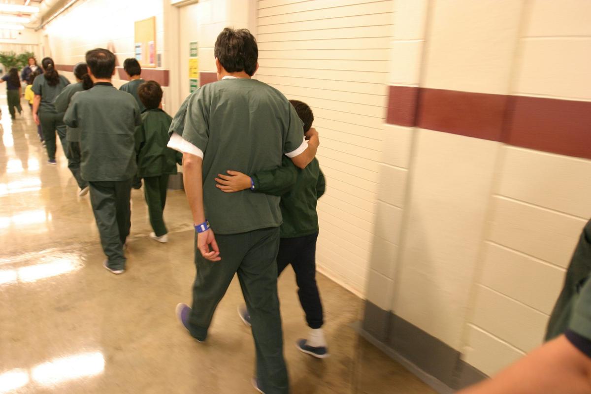  Families and their children walk along the halls of the T. Don Hutto Residential Center in Taylor, Texas, an ICE detention facility for families. Robert Daemmrich Photography Inc/Corbis via Getty Images 