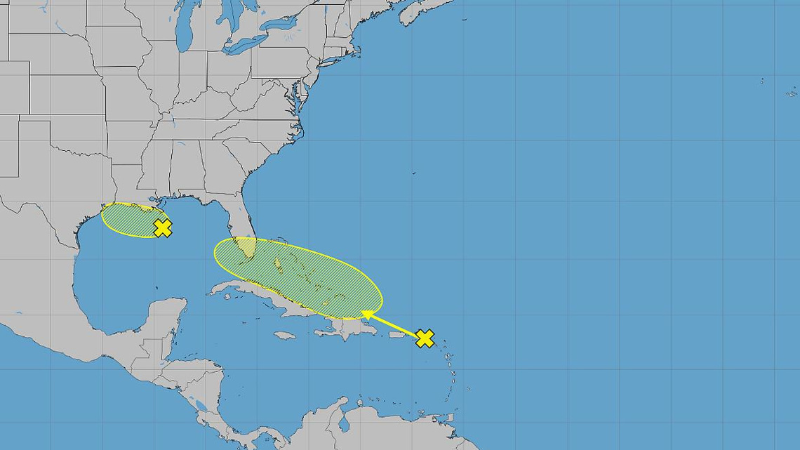 Hurricane center tracking 2 systems, including remnants of Tropical Storm Dolly 