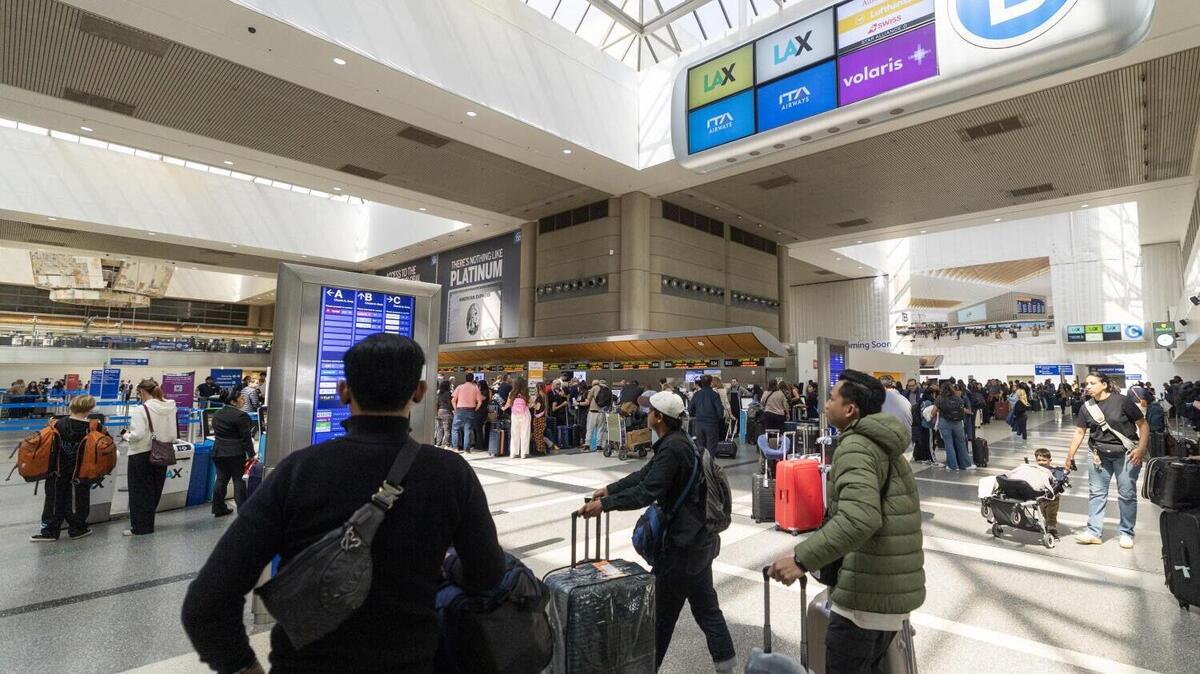 LOS ANGELES, CA - MARCH 27: Passengers inside the Tom Bradley International Terminal at Los Angeles International Airport in Los Angeles, CA on Friday, March 27, 2026. (Myung J. Chun / Los Angeles Times)