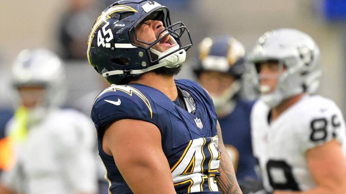  Nov 30, 2025; Inglewood, California, USA; Los Angeles Chargers linebacker Tuli Tuipulotu (45) reacts after a sack against the Las Vegas Raiders during the second half at SoFi Stadium. Mandatory Credit: Jayne Kamin-Oncea-Imagn Images | IMAGN IMAGES via Reuters Connect 