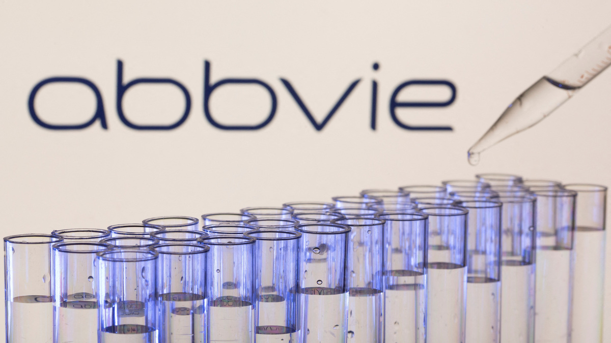 FILE PHOTO: Test tubes are seen in front of a displayed Abbvie logo in this illustration taken, May 21, 2021. REUTERS/Dado Ruvic/Illustration/File Photo