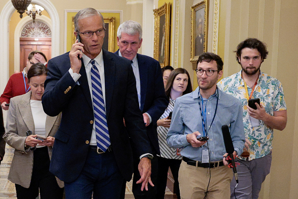 U.S. Senate Majority Leader John Thune (R-SD) uses a phone, on the day of Senate votes, on Capitol Hill in Washington, D.C., U.S., June 4, 2026. REUTERS/Evan Vucci
