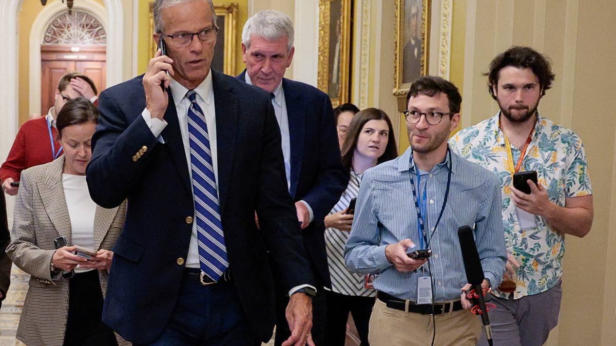 U.S. Senate Majority Leader John Thune (R-SD) uses a phone, on the day of Senate votes, on Capitol Hill in Washington, D.C., U.S., June 4, 2026. REUTERS/Evan Vucci