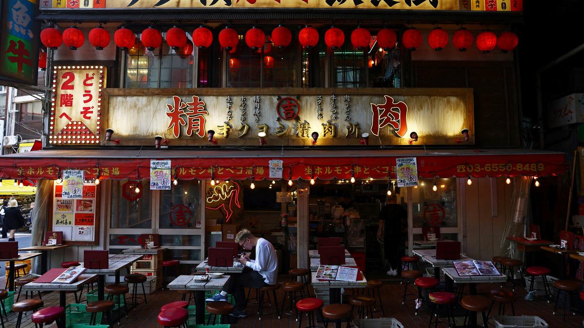 A man takes a lunch at a restaurant in the Ameyoko shopping district in Tokyo, Japan, May 15, 2025.  REUTERS/Issei Kato