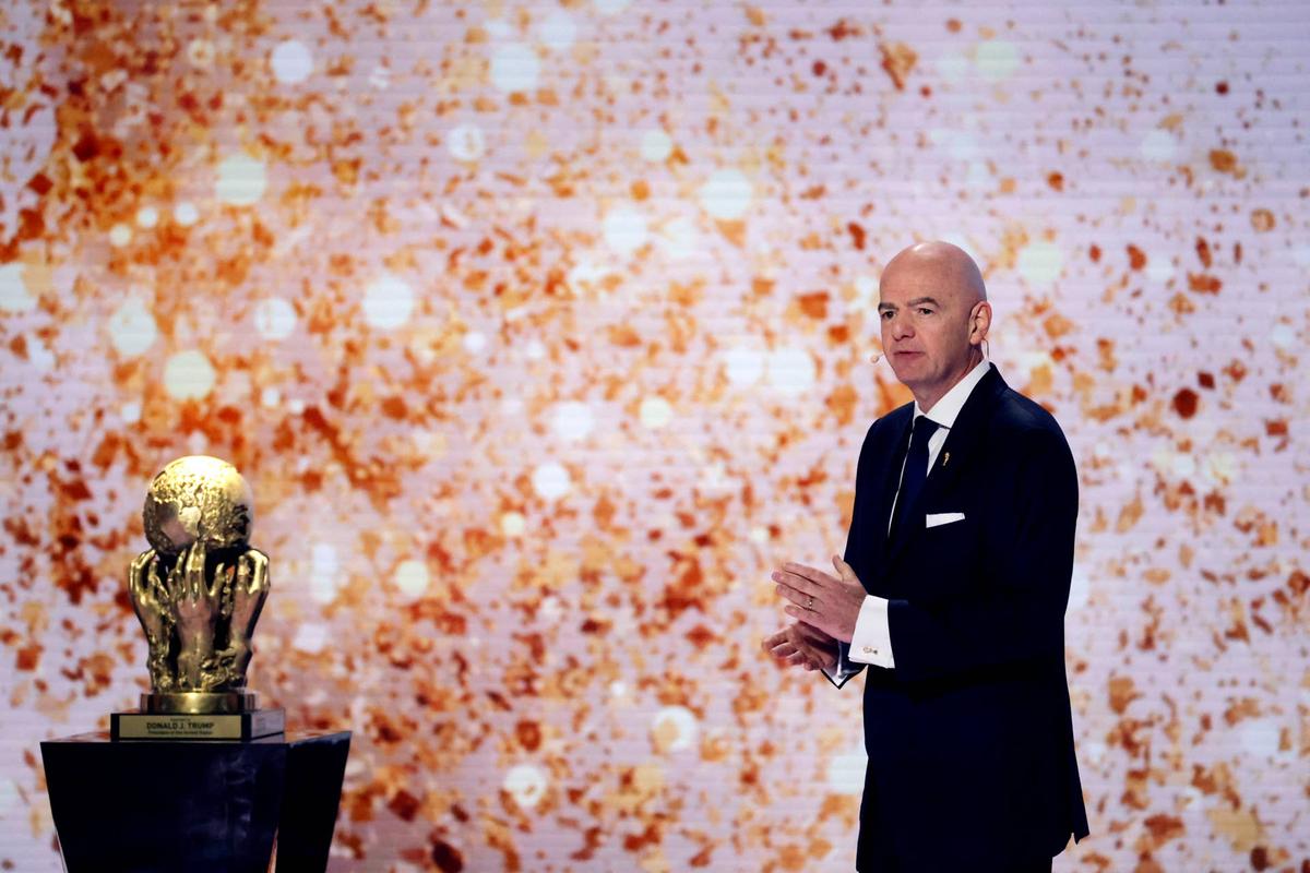  Dec 5, 2025; Washington, District of Columbia, USA; FIFA president Gianni Infantino with the FIFA Peace Prize during the FIFA World Cup 2026 Final Draw at John F. Kennedy Center for the Performing Arts. Mandatory Credit: Amber Searls-Imagn Images 