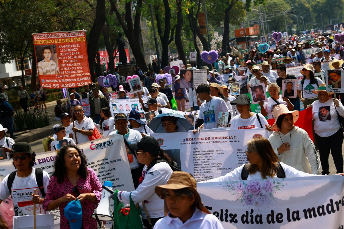 Collectives and families of the disappeared march on Mother's day asking for support in their fight against impunity in Mexico ahead of the 2026 FIFA World Cup, in Mexico City, Mexico May 10, 2026. REUTERS/Raquel Cunha