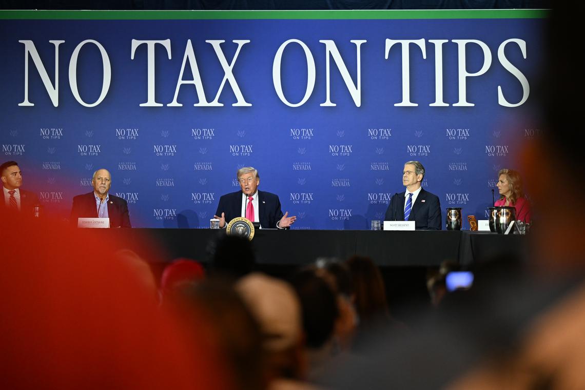 President Donald Trump, center, speaks while participating in a Tax Day roundtable at the AC Hotel Las Vegas Symphony Park in Las Vegas, on Thursday, April 16, 2026, as Nevada Lt. Gov. Stavros Anthony, center left, and Treasury Secretary Scott Bessent, center right, look on. (Kenny Holston/The New York Times)