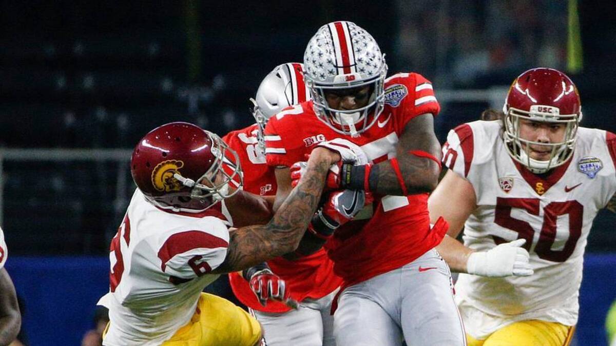  Ohio State Buckeyes linebacker Jerome Baker (17) hangs on as USC Trojans wide receiver Michael Pittman Jr. (6) tries to strip the ball from Baker after he recovered a fumble during the second quarter of the Goodyear Cotton Bowl Classic between the Ohio State Buckeyes and the USC Trojans on Friday, December 29, 2017 at AT&T Stadium in Arlington, Texas. [Joshua A. Bickel/Dispatch] | Joshua A. Bickel/Columbus Dispatch / USA TODAY NETWORK 