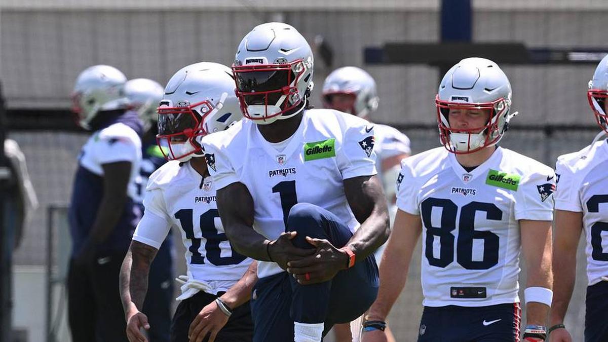  Jun 2, 2026; Foxborough, MA, USA; New England Patriots wide receiver A.J. Brown (1) warms up during the team's OTA at Gillette Stadium. Mandatory Credit: Eric Canha-Imagn Images | Eric Canha-Imagn Images 