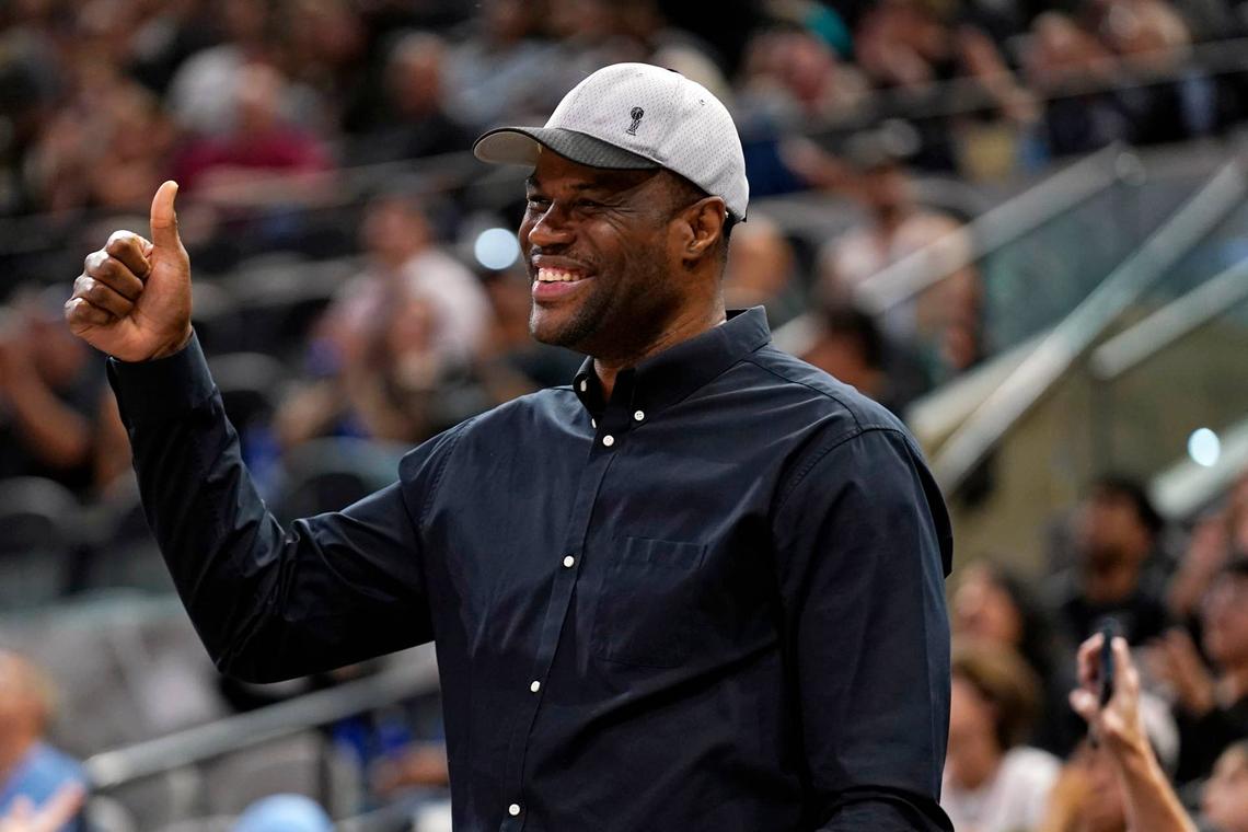  Former San Antonio Spurs and Basketball Hall of Famer David Robinson stands to be honored during military appreciation night at AT&T Center. Scott Wachter-USA TODAY Sports via Imagn Images