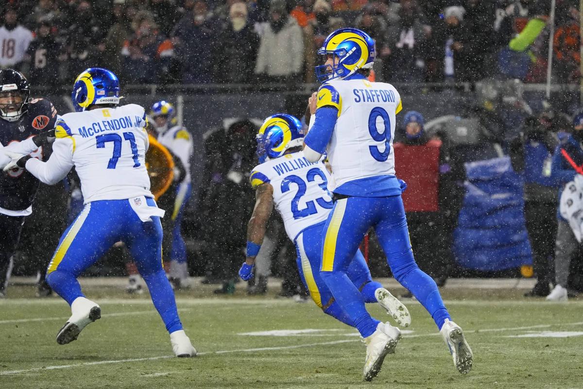  Jan 18, 2026; Chicago, IL, USA; Los Angeles Rams quarterback Matthew Stafford (9) looks to throw a pass against the Chicago Bears during the first quarter of an NFC Divisional Round game at Soldier Field. Mandatory Credit: David Banks-Imagn Images 