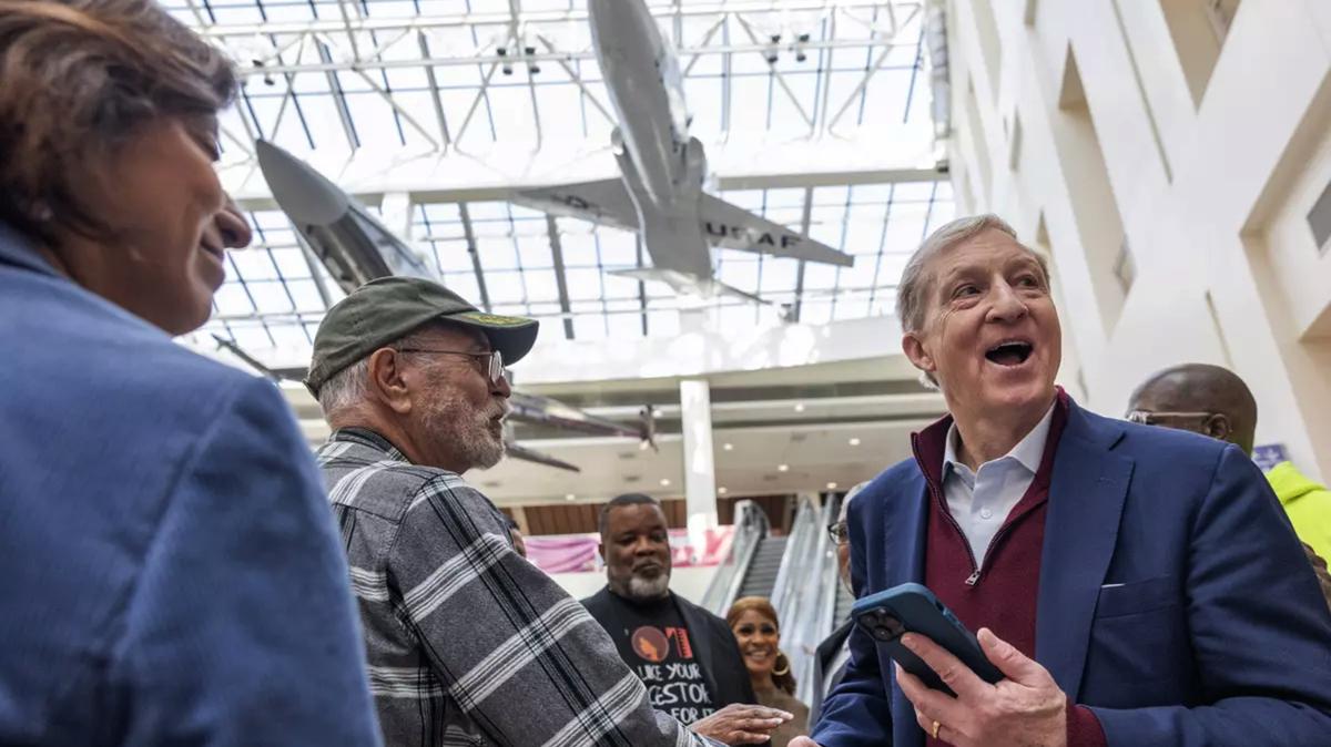 Gubernatorial candidate Tom Steyer, right, meets attendees after the California Governor Candidate Forum at the California Science Center in Los Angeles in January. (Myung J. Chun/Los Angeles Times/TNS)