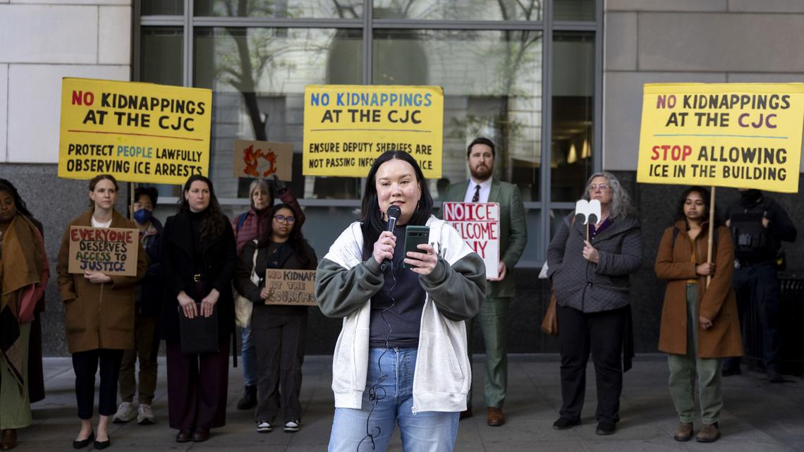 Elena Emelchin Brunner, an immigrant rights organizer at Asian Americans United, speaks at a rally and news conference to stop ICE arrests at the courthouse in Philadelphia on Tuesday. (Tyger Williams/The Philadelphia Inquirer/TNS)