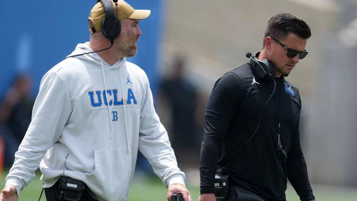  May 2, 2026; Pasadena, CA, USA; UCLA Bruins defensive coordinator Colin Hitschler (left) and head coach Bob Chesney during the spring game at Rose Bowl. Mandatory Credit: Kirby Lee-Imagn Images | Kirby Lee-Imagn Images 