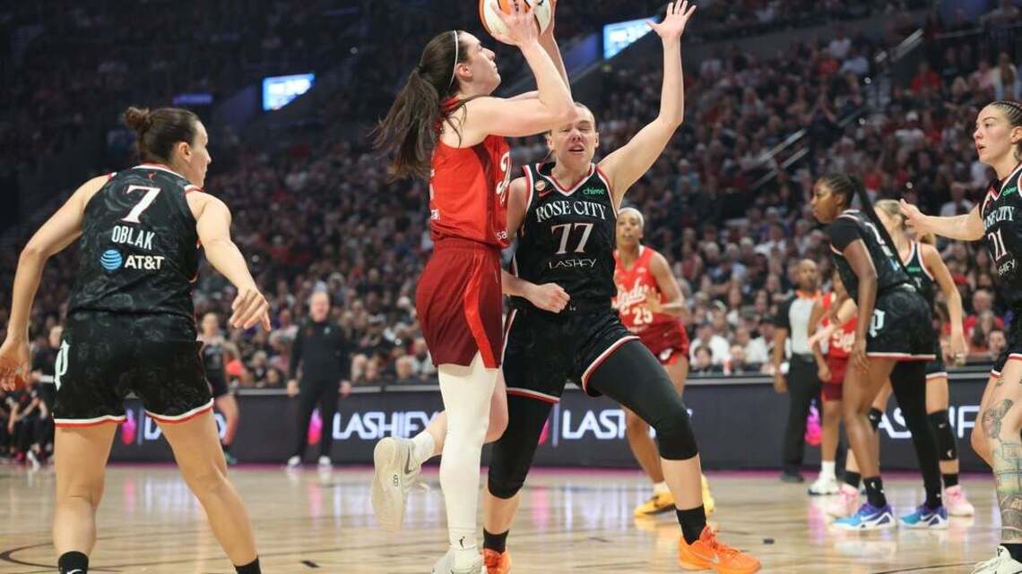 Caitlin Clark's triple-double sends high-scoring Fever past Fire
