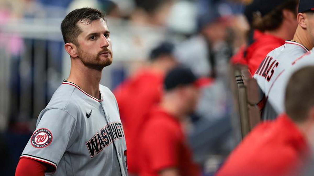  May 8, 2026; Miami, Florida, USA; Washington Nationals starting pitcher Foster Griffin (22) looks on from inside the dugout against the Miami Marlins during the seventh inning at loanDepot Park. | Sam Navarro-Imagn Images 