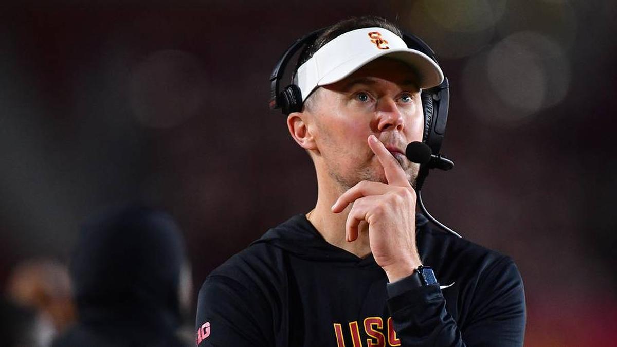  Nov 7, 2025; Los Angeles, California, USA; Southern California Trojans head coach Lincoln Riley watches game action against the Northwestern Wildcats during the second half at the Los Angeles Memorial Coliseum. Mandatory Credit: Gary A. Vasquez-Imagn Images | Gary A. Vasquez-Imagn Images 