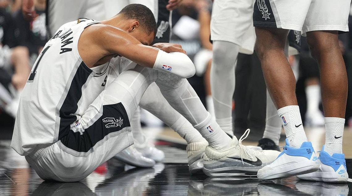  San Antonio Spurs forward Victor Wembanyama (1) reacts after falling to the ground during the first half of game two of the first round of the 2026 NBA Playoffs against the Portland Trail Blazers at Frost Bank Center. Scott Wachter-Imagn Images