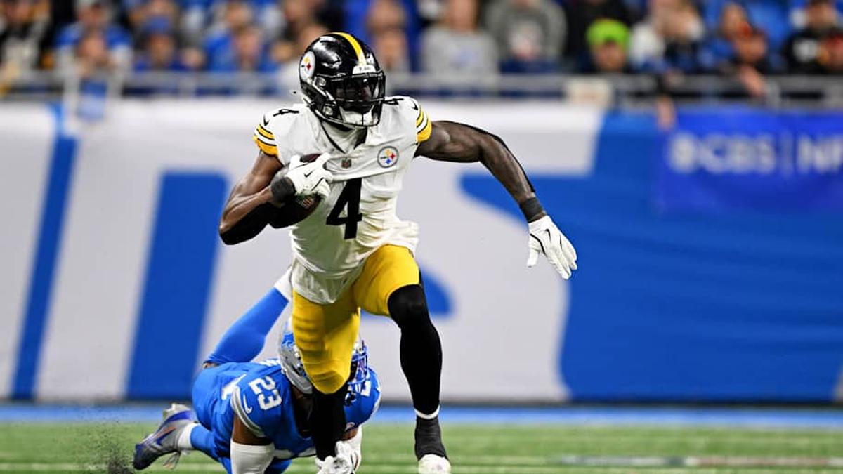  Dec 21, 2025; Detroit, Michigan, USA; Detroit Lions cornerback Rock Ya-Sin (23) tackles Pittsburgh Steelers wide receiver DK Metcalf (4) during the fourth quarter at Ford Field. Mandatory Credit: Lon Horwedel-Imagn Images | Lon Horwedel-Imagn Images 