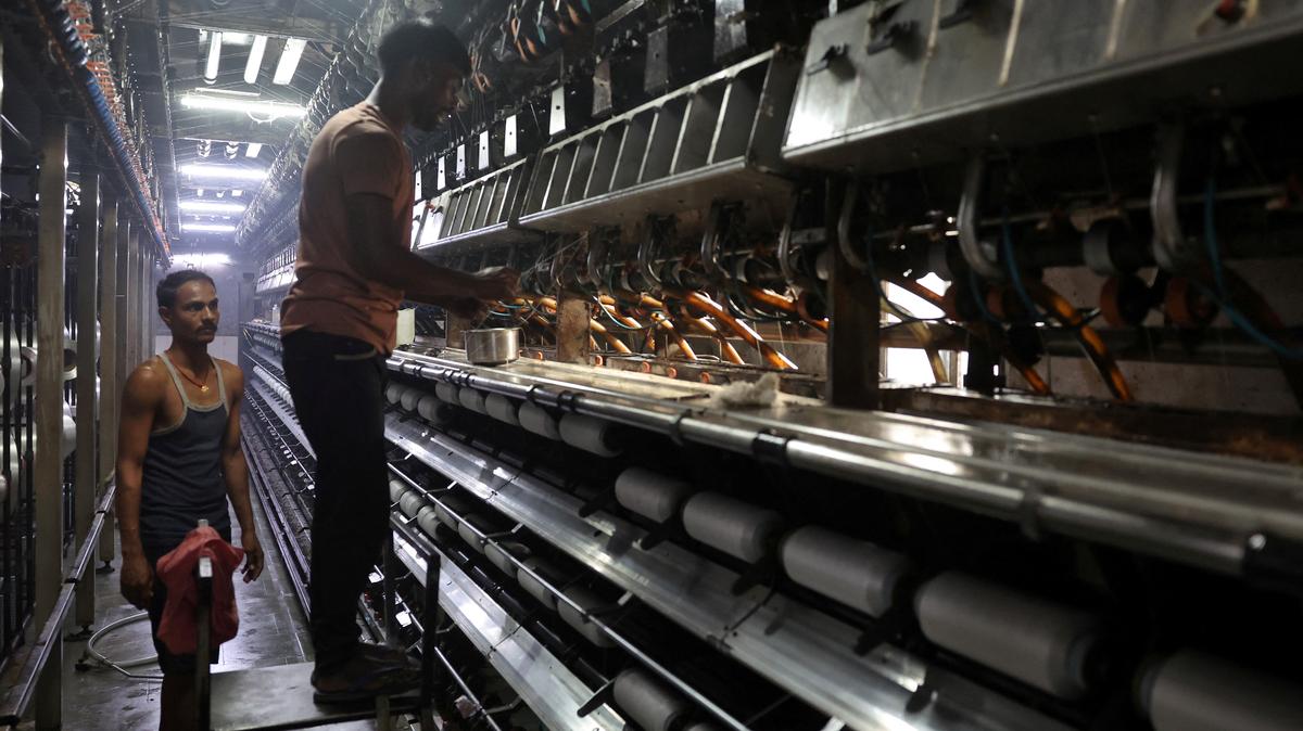 Employees work inside a polyester yarn manufacturing unit of Radheshyam Textiles at Pipodara, on the outskirts of Surat, Gujarat, April 16, 2026. REUTERS/Amit Dave