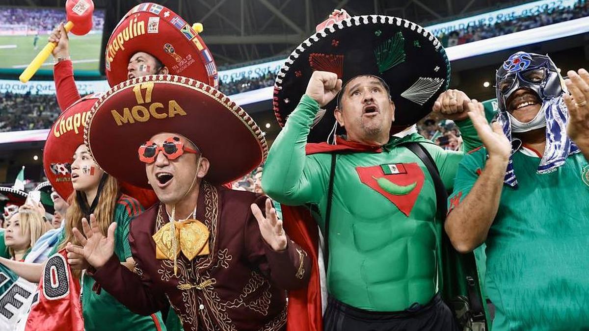  Mexican fans go all out. | Mohammed Dabbous/Anadolu Agency/Getty Images 