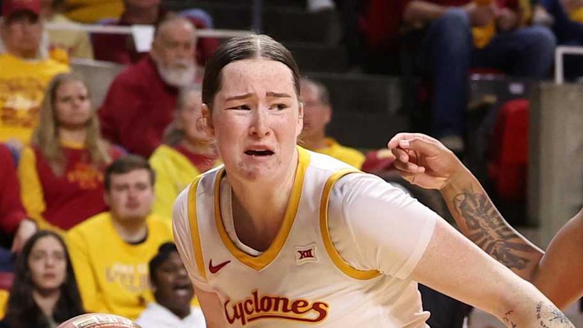  Feb 25, 2026; Ames, Iowa, USA; Oklahoma State Cowboys guard Stailee Heard (32) defends Iowa State Cyclones forward Addy Brown (24) in the first half at James H. Hilton Coliseum. Mandatory Credit: Reese Strickland-Imagn Images | Reese Strickland-Imagn Images 