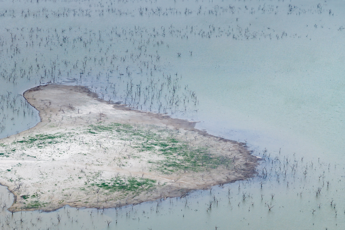  In an aerial view, a dried portion of land is surfaced at the Choke Canyon Reservoir within the Choke Canyon State Park on May 07, 2026 in Three Rivers, Texas. 