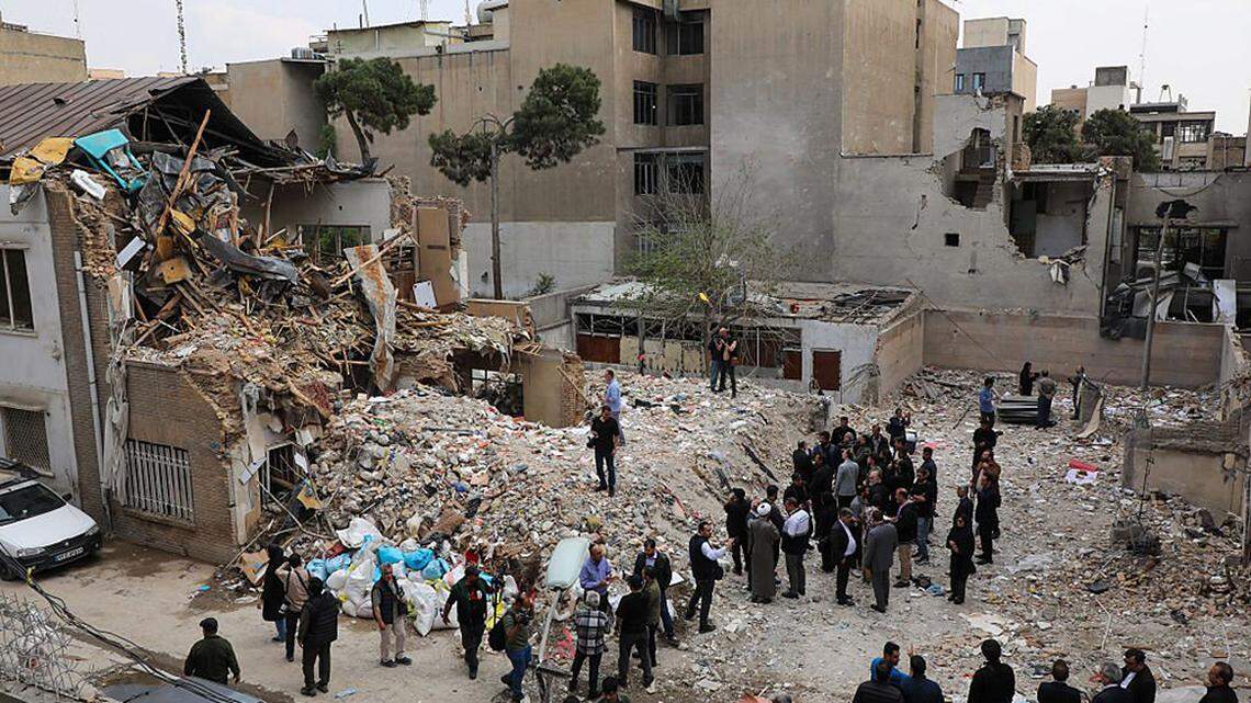 Representatives from more than a dozen foreign diplomatic missions, United Nations offices, and the media tour damage to sites previously targeted by U.S.-Israeli strikes in Tehran, Iran, on Monday. Despite sending mixed signals in recent days, both the United States and Iran gave clearer indications on Monday that they were planning to send negotiators to peace talks in Pakistan this week.